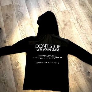 Zara’s Black Hoodie with Motivational Text